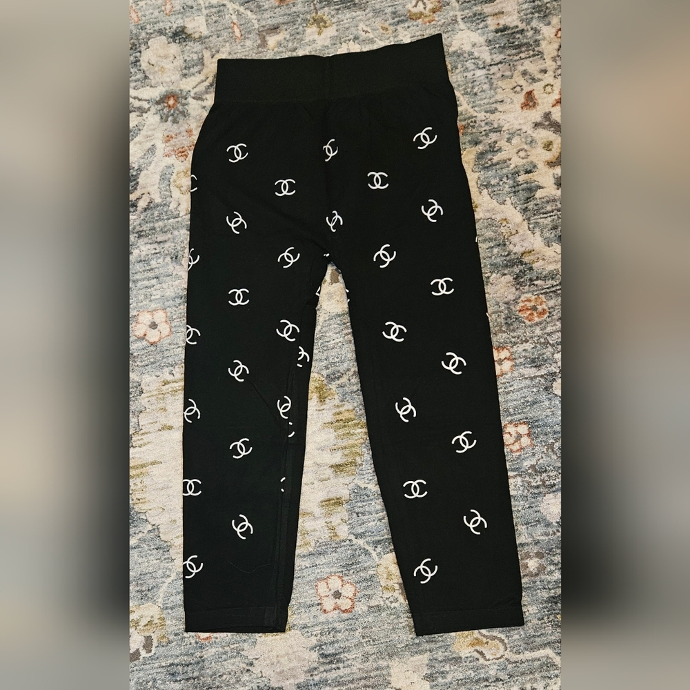 Elegant Black Women's Leggings with Iconic Pattern